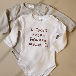 Zīdaiņu Bodijkrekliņš Nu Tavās(i) rociņās (i) baltā krāsā