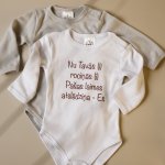 Zīdaiņu Bodijkrekliņš Nu Tavās(i) rociņās (i) baltā krāsā